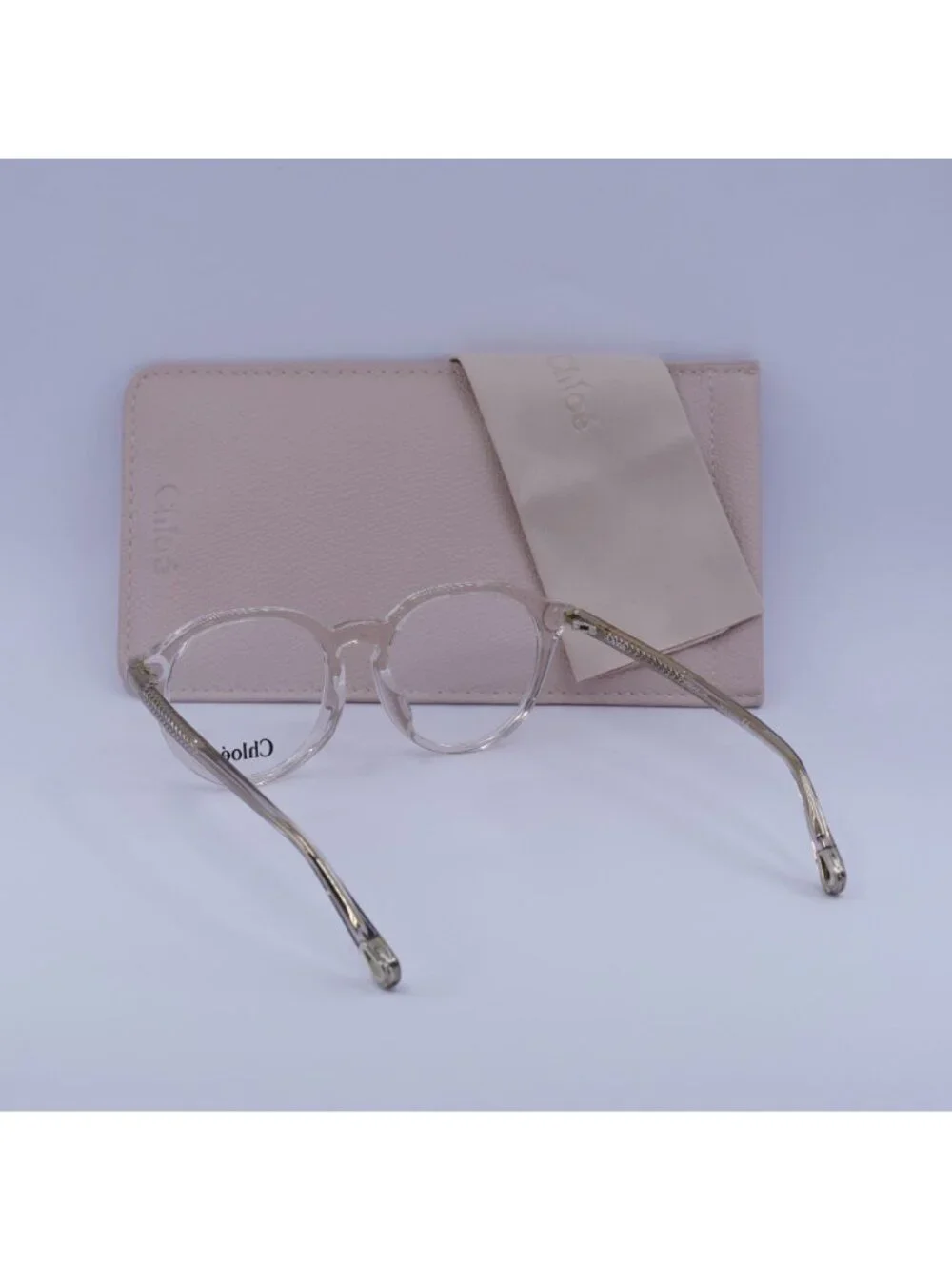 Chloe CH0012OA 001 Round Eyeglasses 50mm - Transparent Pink